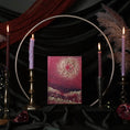 Load image into Gallery viewer, A s13 moon journal 2027 cover featuring a swirling galaxy design in deep magenta and gold, styled on a black fabric backdrop with lit candles, a metal hoop, and pampas grass.
