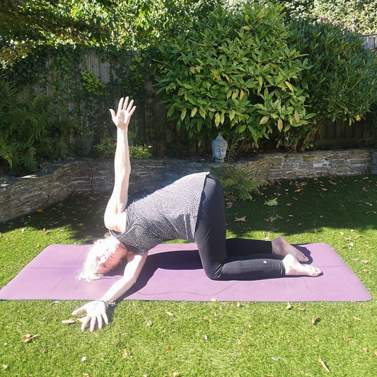 New Moon Yoga –  Thread the Needle Pose