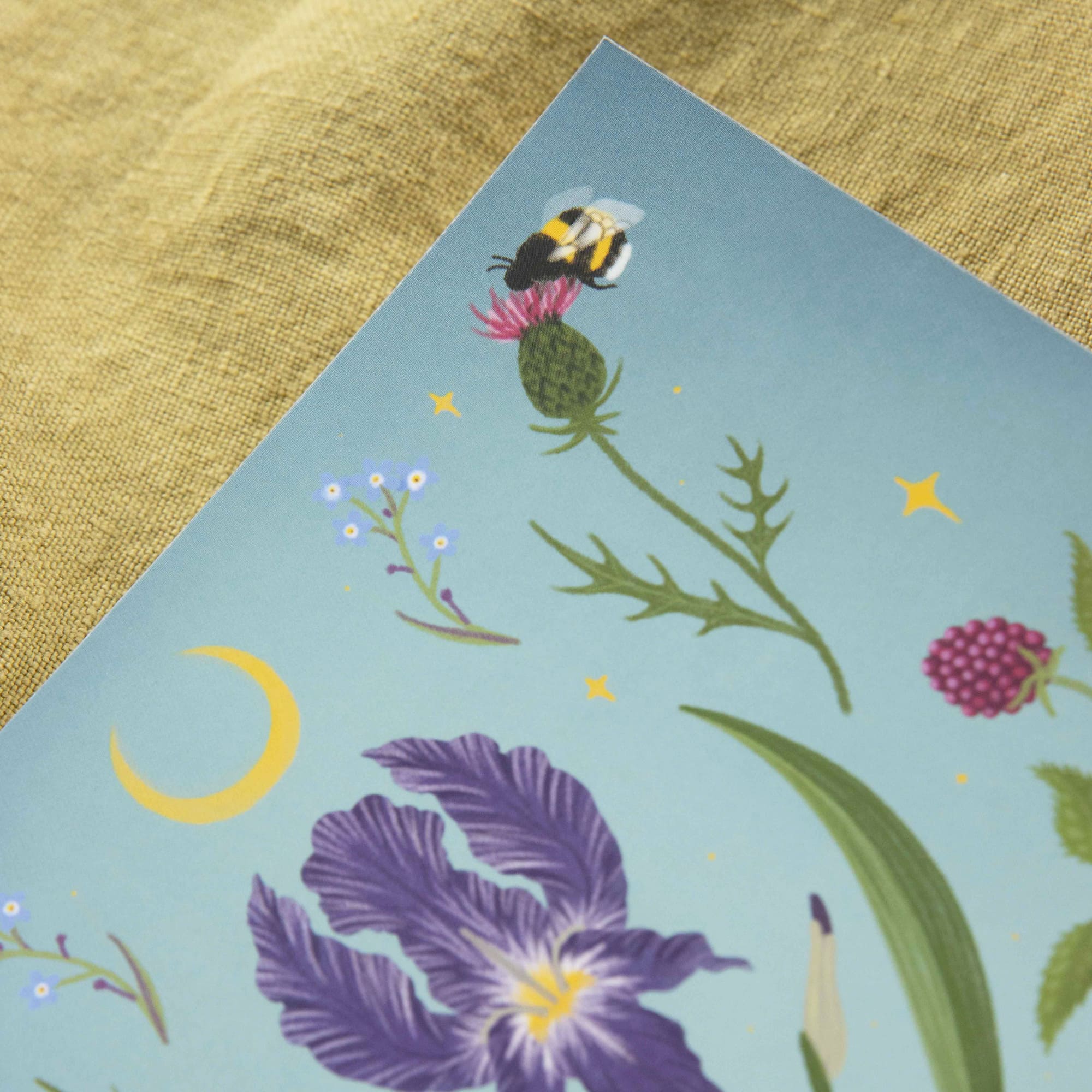 Yoga mat with floral and bee design on a textured surface